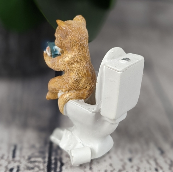 Orange ginger cat using phone while sitting on a toilet, feline statue figurine - Picture 3 of 9